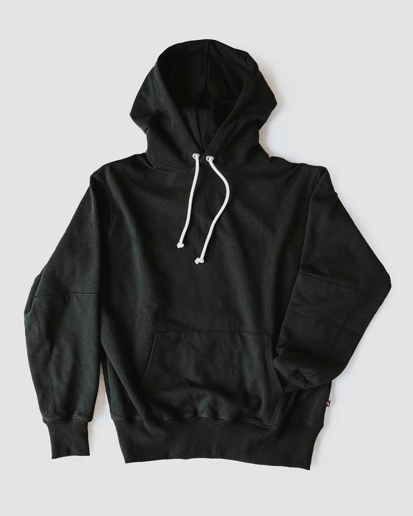 Svart grejarhoodie